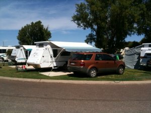 Well maintained lawn caravan and camping sites at Arno Bay Caravan Park.